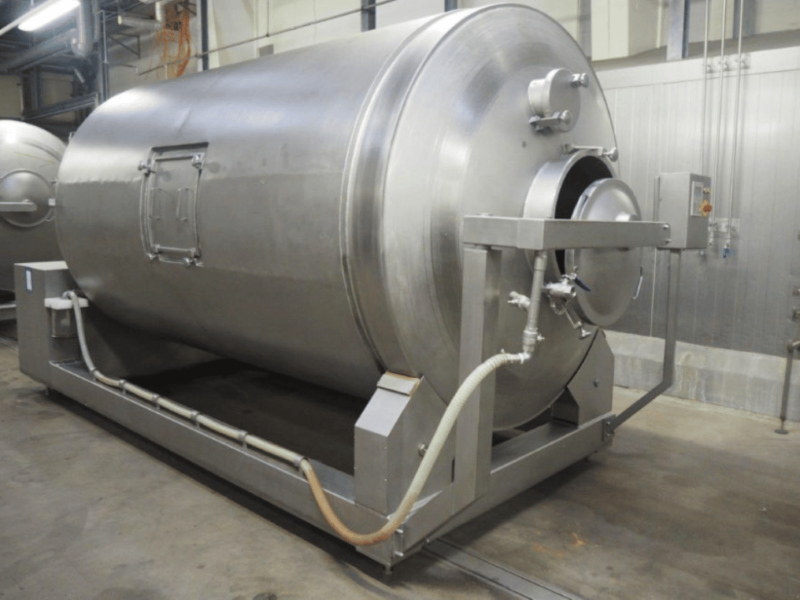 Vacuum tumbler with cooling system