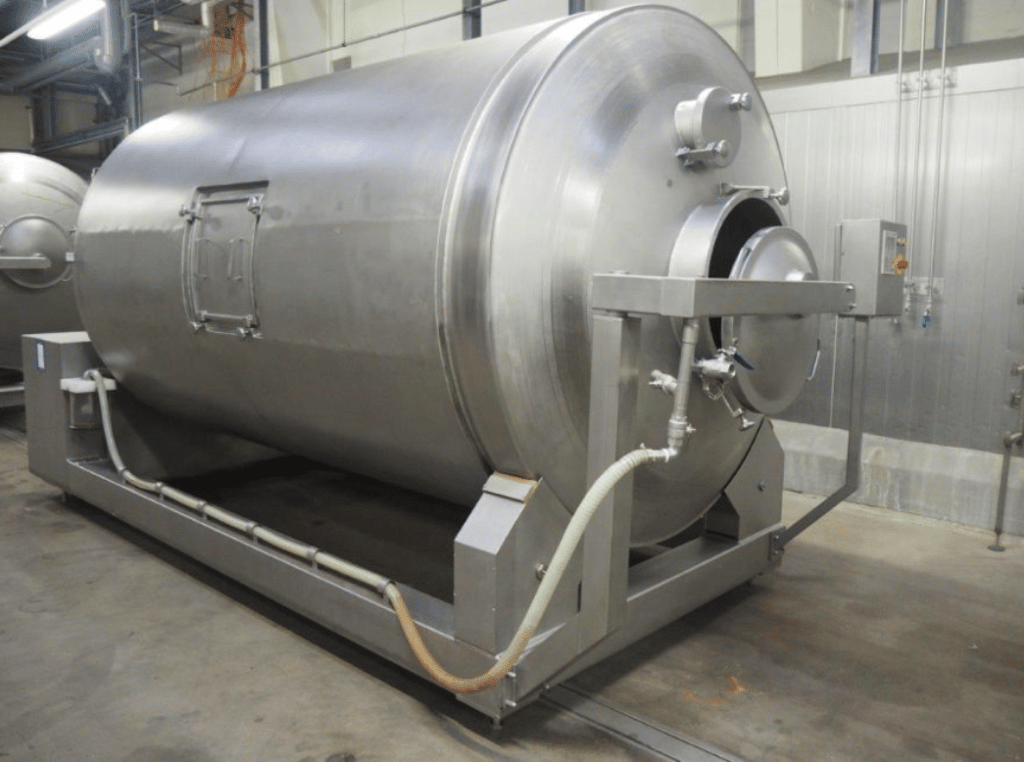 Vacuum tumbler with cooling system
